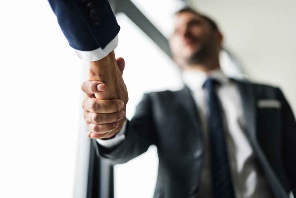 How to Evaluate an International Supplier Before Doing Business Handshake Business Men Concept 1024x683